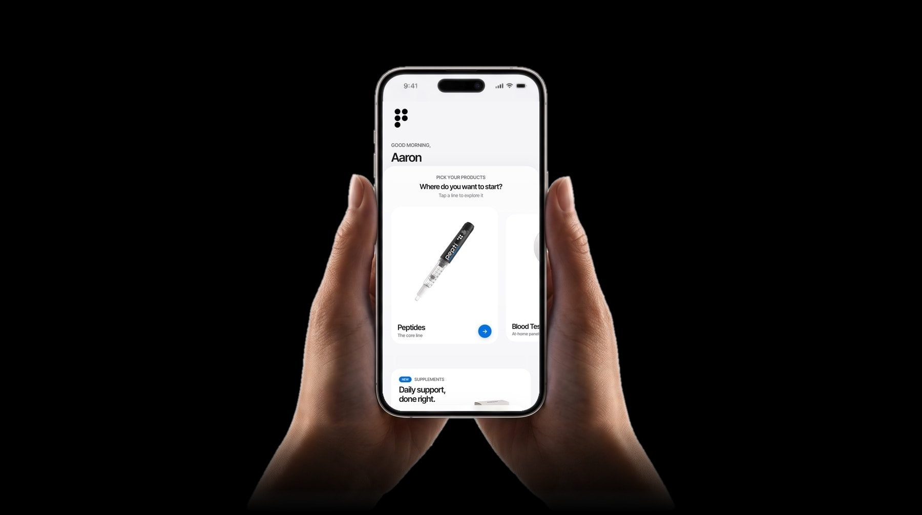 Two hands holding an iPhone showing the pepti app home screen